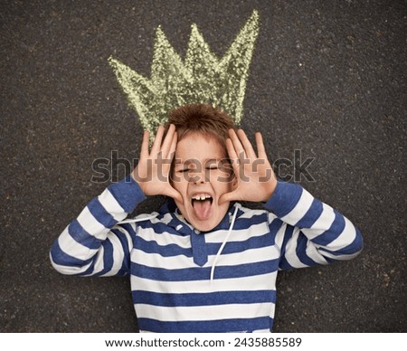 Chalk art, funny face or boy with crown on floor for drawing, imagine or future fantasy on black background. King, emoji or kid with royalty, sketch prince or dream for school, project or assignment