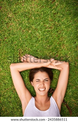 Woman, portrait and top view on grass for relax with funny face, peace sign and weekend break in summer. Young person, happy and confident on lawn, garden or backyard of home for fresh air on mockup