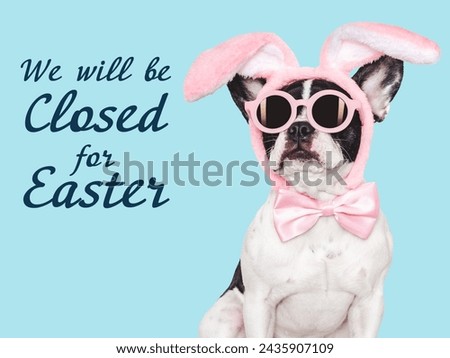 We will be closed for Easter. Signboard. Lovable, pretty puppy. Closeup, studio shot, indoors. Day light. Congratulations for family, loved ones, relatives, friends and colleagues. Pets care concept