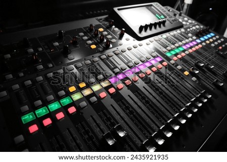 Mixer control. Music engineer. Backstage controls on an audio mixer, Sound mixer. Professional audio mixing console with lights, buttons, faders and sliders. sound check for concert. Royalty-Free Stock Photo #2435921935