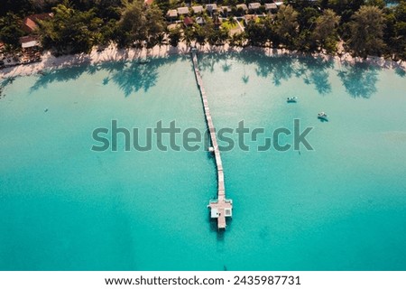 Wooden bridge at the beach and clear blue water,Go to the beach