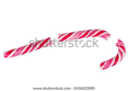Broken candy cane isolated on white background.Top view