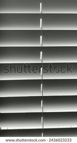 Close up picture of a hard plastic curtain.