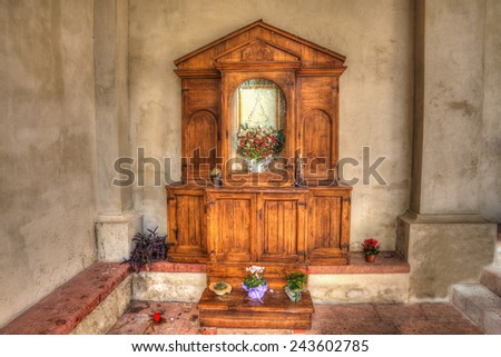 wooden altar in an italian church. hdr tone mapping.