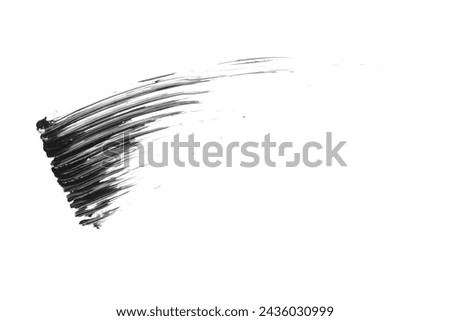 Smear of mascara isolated on white, top view