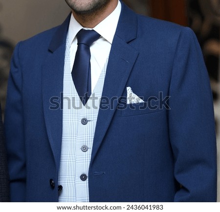 Male arm in blue suit set tie closeup. White collar management job serious move secretary student luxury formal interview executive agent marriage store corporate elegance employment preparation Royalty-Free Stock Photo #2436041983