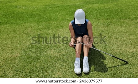 Golfer on a professional golf course. Angry golfer got upset over losing and broke his club Royalty-Free Stock Photo #2436079577