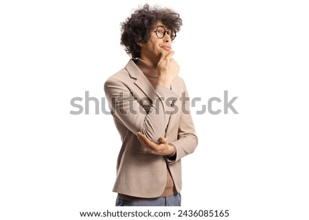 Young man with glasses thinking and looking up isolated on white background