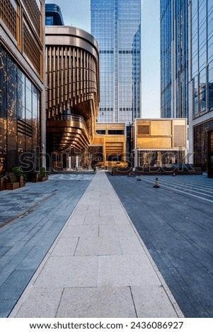 square front of modern office buildings in Shanghai financial district. Royalty-Free Stock Photo #2436086927
