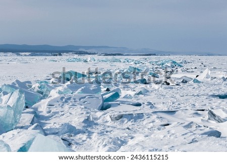 Hummocks on Lake Baikal, the deepest and largest freshwater lake by volume in the world, located in southern Siberia, Russia Royalty-Free Stock Photo #2436115215