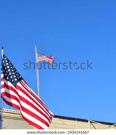 Blue sky over American flags