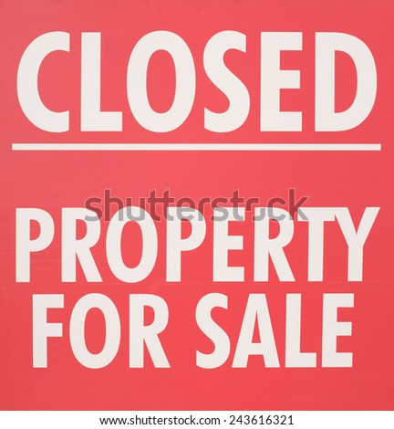 Closed - property for sale sign on red.