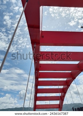 red bridge with beautiful blue skies and clear air in the area of the bridge