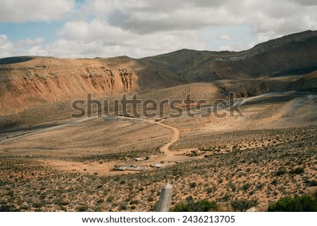 Road leading towards the Salinas Grandes salt flats near Purmamarca. High quality photo