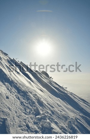 Mt Yotei steep ascent in Snow to top Views sun panorama Hokkaido Japan. High quality photo Royalty-Free Stock Photo #2436226819