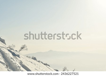 Mt Yotei steep ascent in Snow to top Views sun panorama Hokkaido Japan. High quality photo Royalty-Free Stock Photo #2436227521