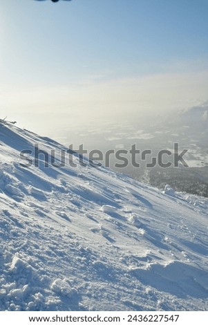 Mt Yotei steep ascent in Snow to top Views sun panorama Hokkaido Japan. High quality photo Royalty-Free Stock Photo #2436227547