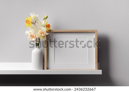 Blnank landscape picture frame mockup with flowers, blank mockup with copy space