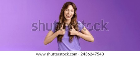 Good idea lets do it. Cheerful upbeat feminine girl recommend good skincare product professional stylish like new hairstyle show thumbs up sign agree approving nice job encourage well done. Royalty-Free Stock Photo #2436247543