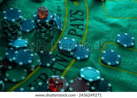 Poker chips on bokeh background. Casino theme.