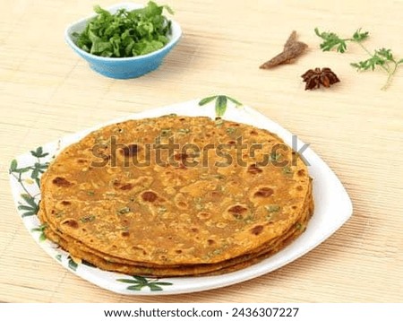 Masala paratha very delicious and super in taste.its amazing and very crunchy.  Royalty-Free Stock Photo #2436307227