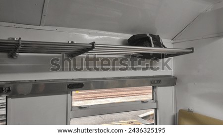 A rack to put the bags and carrier of passenger of the train during the journey 