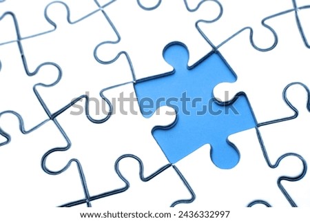 Piece missing from jigsaw puzzle Royalty-Free Stock Photo #2436332997
