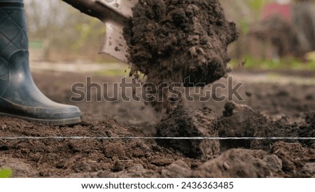 agriculture, farmer dripping soil foot rubber boots, ground, earth business, farmer digging soil shovel garden, agricultural work, shoveling fertile soil, farmer digging garden soil shovel, own small Royalty-Free Stock Photo #2436363485