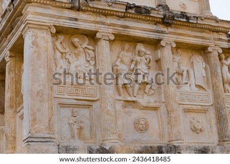 Closeup of figured marble reliefs of antique temple Sebasteion with mythological, allegorical and imperial subjects in ancient city of Aphrodisias, Turkey Royalty-Free Stock Photo #2436418485