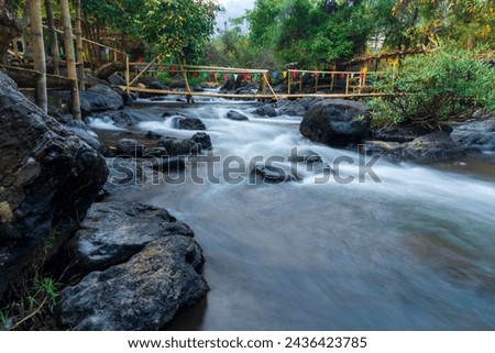 Public area for swimming and cooling off clear river There are rocky rapids and cool water At Mae Hong Son