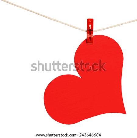 Red heart hang on clothesline isolated on white. Valentine's Day