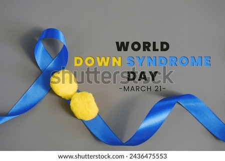 World Down Syndrome Day with blue ribbon and yellow bubbles