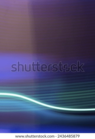 Neon light trail on metallic background