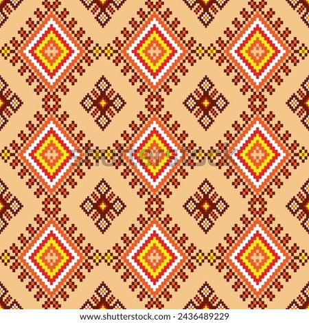 Seamless pattern in the style of Native Americans. It features red, orange, and yellow geometric design for squares,diamonds,fabric,boho,carpet,fabric,ikat,tribal,batik,vector,illustration,pattern