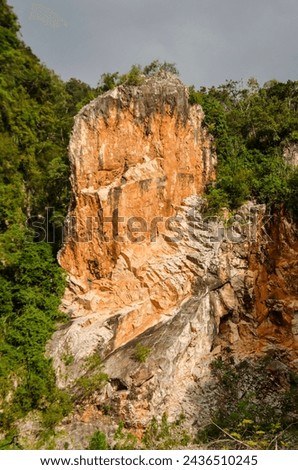 Limestone mountain seen Kin Loong Valley, Ipoh, Perak, Malaysia. Royalty-Free Stock Photo #2436510245