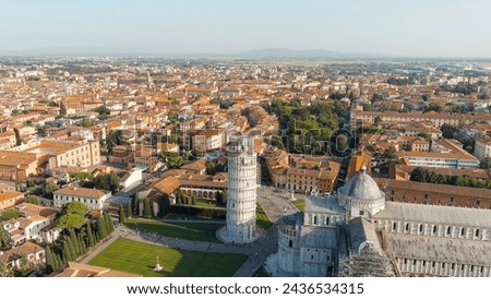 Pisa, Italy. The famous Leaning Tower and Pisa Cathedral in Piazza dei Miracoli. Summer. Evening hours, Aerial View   Royalty-Free Stock Photo #2436534315