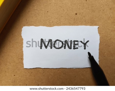 Money writting on table background.