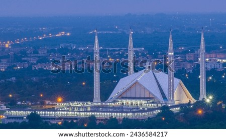 The Faisal Mosque (Urdu: فیصل مسجد, is the national mosque of Pakistan, located in the capital city, Islamabad.it is the fifth-largest mosque in the world, the largest mosque outside the Middle East. Royalty-Free Stock Photo #2436584217