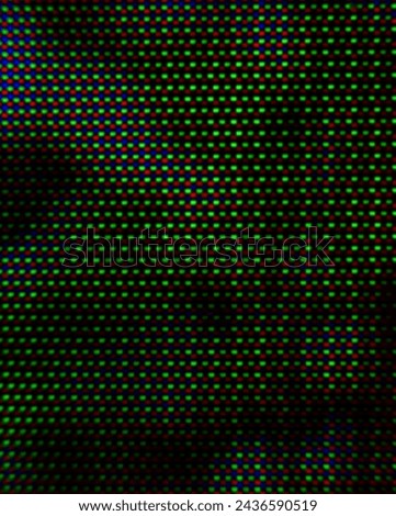 abstract background pattern of colored blurry dots on a dark background close up