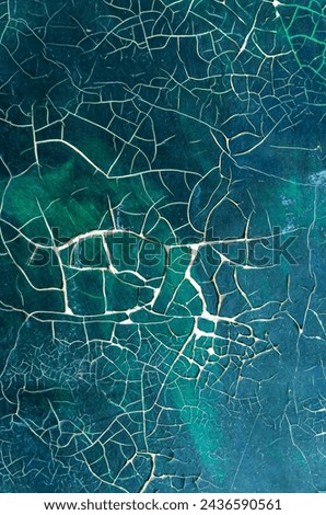 cracked paint on old picture close up abstract background art restoration pattern