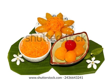 Pictures sweet dessert with coconut cream and put on banana leaf,isolated picture.