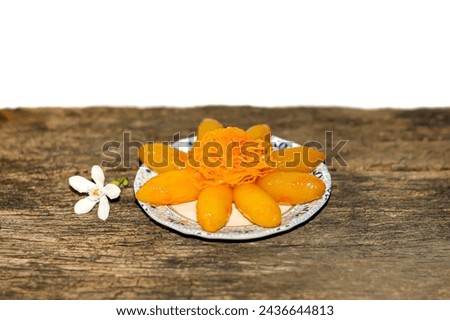 Sweet dessert looks delicious and good taste.put on old wooden with isolated picture.