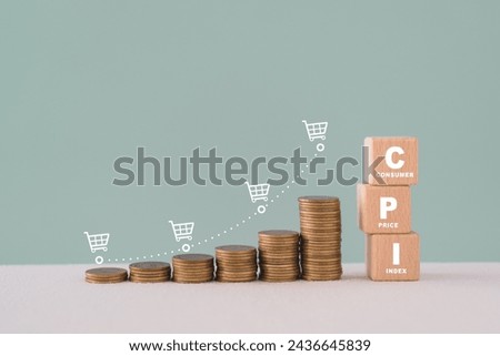 CPI, consumer price index concept. Wooden block with CPI word and stack of coins and increasing graph with shopping cart icon. Goods price inflation and inflation rising. Impact on economic growth
