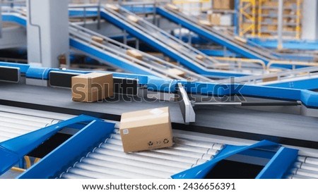 Automated Conveyor Belt Sorting Mechanism in a Logistics Center. Automatic Engineering Solution Handling and Preparing Parcels for Delivery to Clients. Warehouse Shot