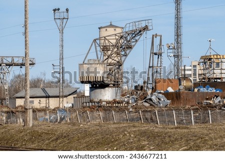 Place of purchase and transhipment of scrap metal. Secondary raw material. Royalty-Free Stock Photo #2436677211
