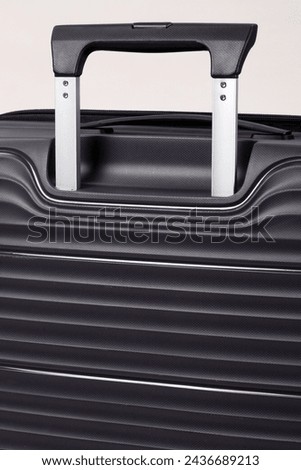close up image of hard case luggage details and accessories