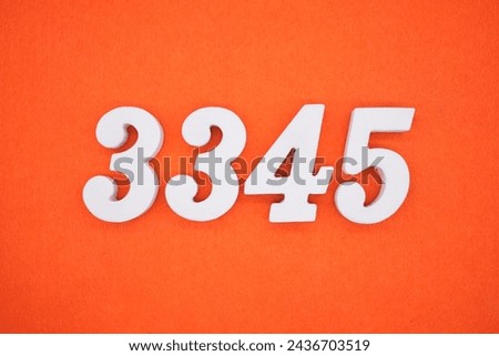 Orange felt is the background. The numbers 3345 are made from white painted wood.