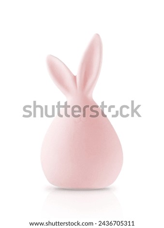 Bunny rabbit pink toy isolated on white background with clipping path. Ceramic figurine for Easter card design.