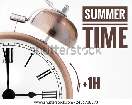 Alarm Clock at 3 o'clock changing to Summer Time.. Daylight Saving Time concept Royalty-Free Stock Photo #2436738393