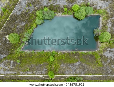 reservoir on the tops of the moors above hebden bridge in the pennine hills of west yorkshire Royalty-Free Stock Photo #2436751939